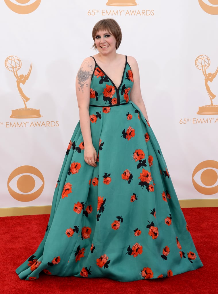 Lena Dunham picked a Prada ball gown with scattered red blooms.