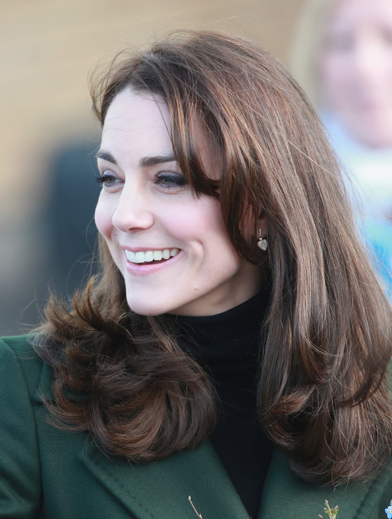 Kate completed her look with dainty drop earrings.
