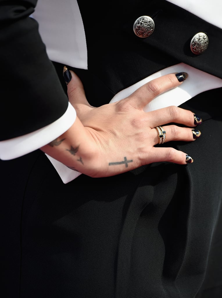 Demi Lovato Rose Finger Tattoo