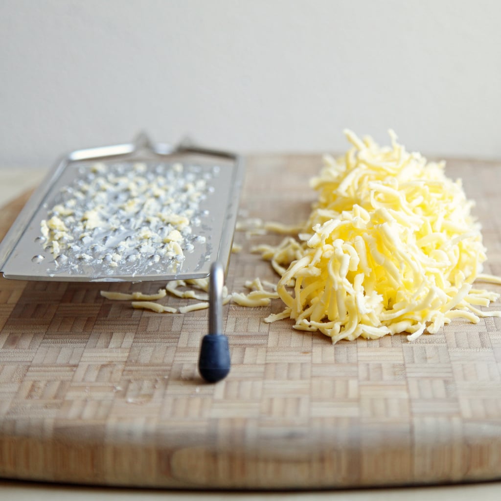 Grate frozen butter.