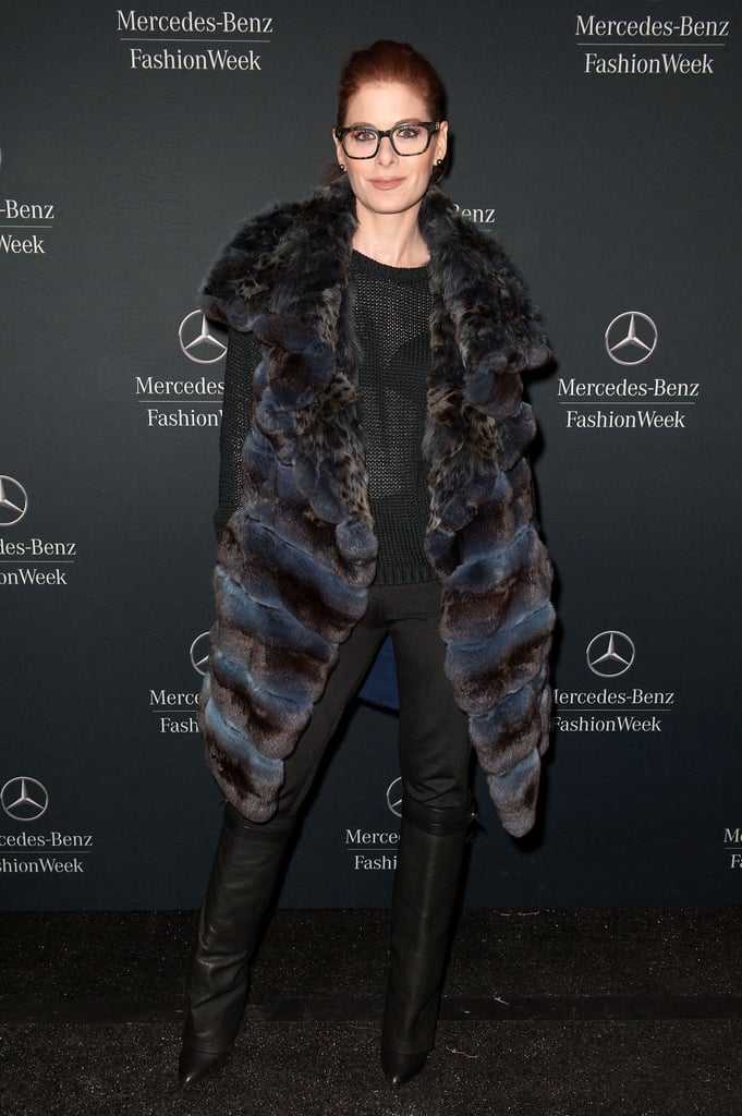 Debra Messing arrived in a fur coat.