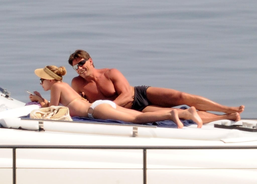 Scarlett Johansson lounged on a boat with her bodyguard during a July 2012 trip to Italy's Taormina Sea.