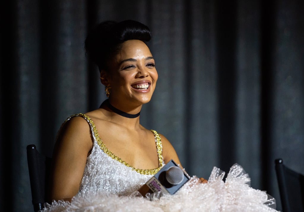 Tessa Thompson is a versatile dresser. The actress pulls off both billowing ballgowns and sharp suits with ease, and that duality was never more exemplified than in a new style post she captioned, "Bride + Groom." Tessa has been exclusively dressing in black and white while on the press tour for Passing, which is shot in black and white, and two of her recent outfits had a matrimonial vibe. (If I were Tessa Thompson, I'd want to marry me, too.) 
For a Los Angeles screening on Oct. 23, Tessa wore white Giambattista Valli separates in a dotted tulle fabric with a gold neckline, giving the appearance of a chainlink neckline. Stylists Wayman Deon and Micah McDonald completed the look with a black choker and sky-high platform stilettos. The contrasting look, meanwhile, consisted of a black Alexandre Vauthier pinstripe suit with a white tuxedo shirt and floral boutonniere. Maison Margiela's famous split-toe heels completed the outfit. Take a closer look at all the dreamy details ahead.

    Related:

            
            
                                    
                            

            These Fashion Moments Prove Tessa Thompson Has the Best Style Game in Hollywood