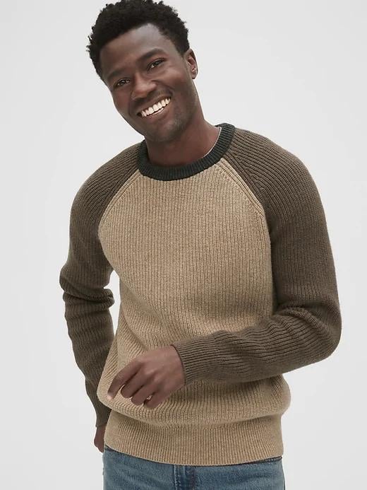 This Textured Colorblock Crewneck Sweater ($70) is a low-key way to help him experiment with color-blocked pieces.