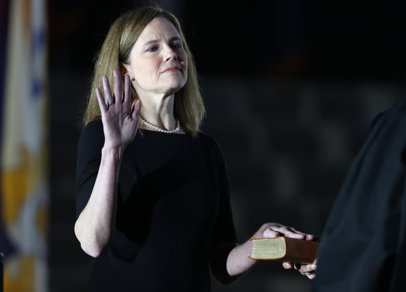 WASHINGTON, DC - OCTOBER 26: U.S. Supreme Court Associate Justice Amy Coney Barrett is sworn in by Supreme Court Associate Justice Clarence Thomas during a ceremonial swearing-in event on the South Lawn of the White House October 26, 2020 in Washington, D