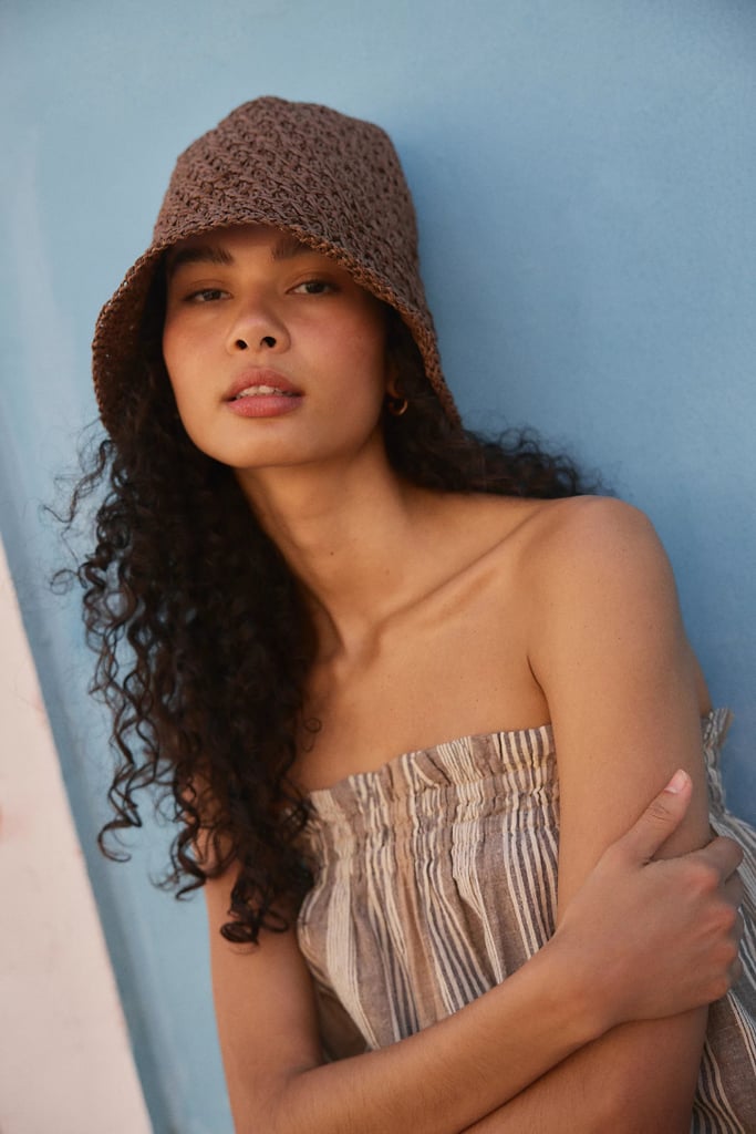 Free People Sailor Straw Hat ($38)
A bestseller on Free People's site at a very good price point, this hat can be worn unfurled or with the brim rounded up. It's perfect for all her summer trips and available in brown, neutral, red, sage, and light sky blue — all of which team perfectly with vacation outfits.