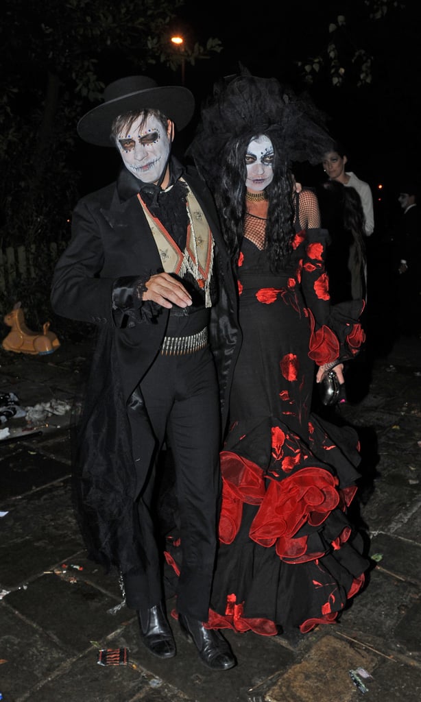 The couple donned spooky versions of Day of the Dead disguises, complete with ghoulish face paint, for British TV host Jonathan Ross's annual bash in London in 2013.