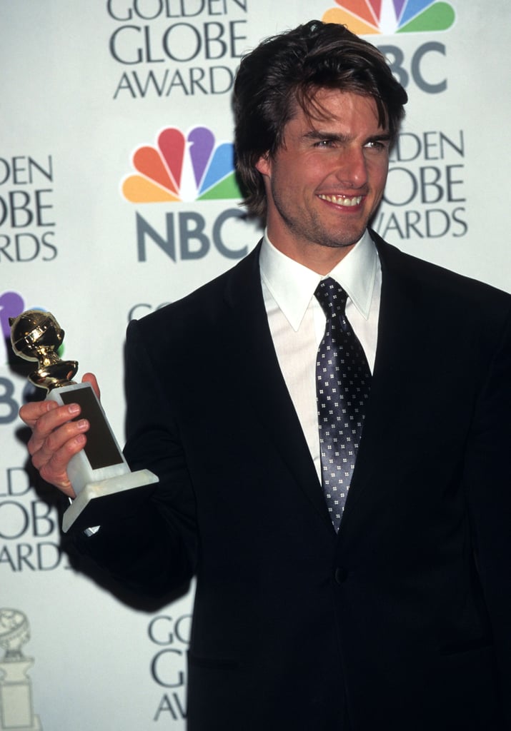 Tom Cruise proudly held up his Golden Globe in 1997.