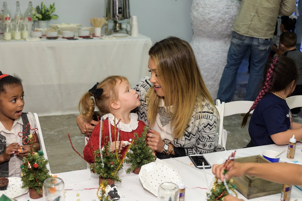 Jessica played with Haven at the Baby2Baby holiday party in December 2014.