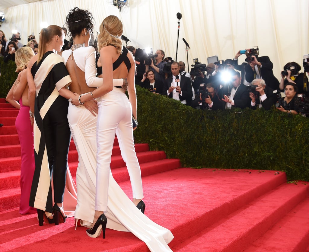 Reese Witherspoon, Stella McCartney, Rihanna, and Cara Delevingne grouped together on their way up the stairs.