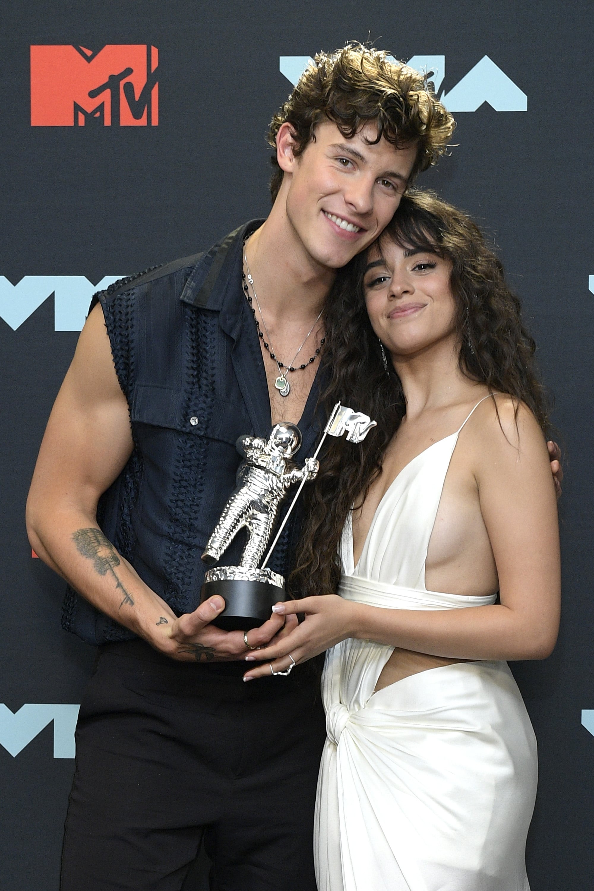 NEWARK, NEW JERSEY - AUGUST 26: Shawn Mendes and Camila Cabello pose with the Best Collaboration Award in the Press Room during the 2019 MTV Video Music Awards at Prudential Centre on August 26, 2019 in Newark, New Jersey. (Photo by Roy Rochlin/Getty Images for MTV)