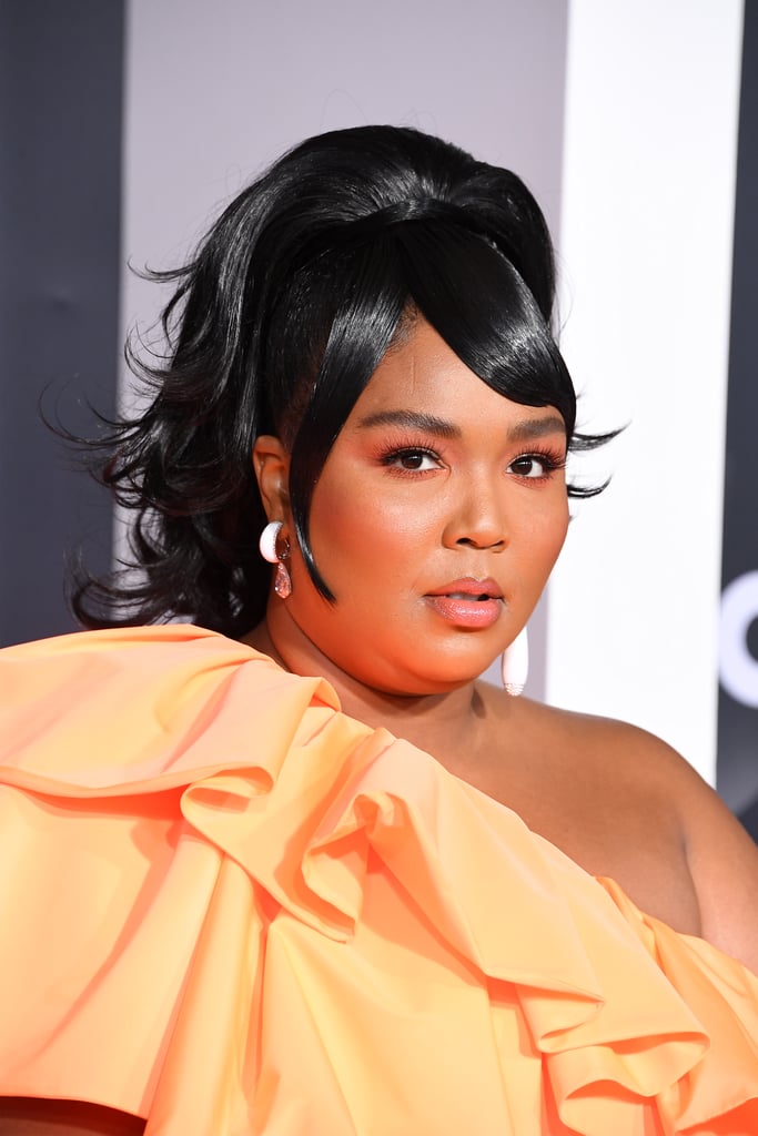 Lizzo's Miniature Valentino Bag and Orange Dress at the AMAs