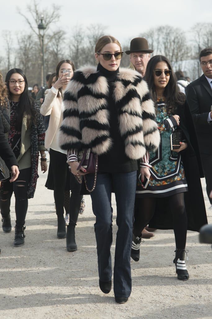 On the streets of Paris, Olivia turned heads in a striped fuzzy jacket that was equal parts cozy and chic.