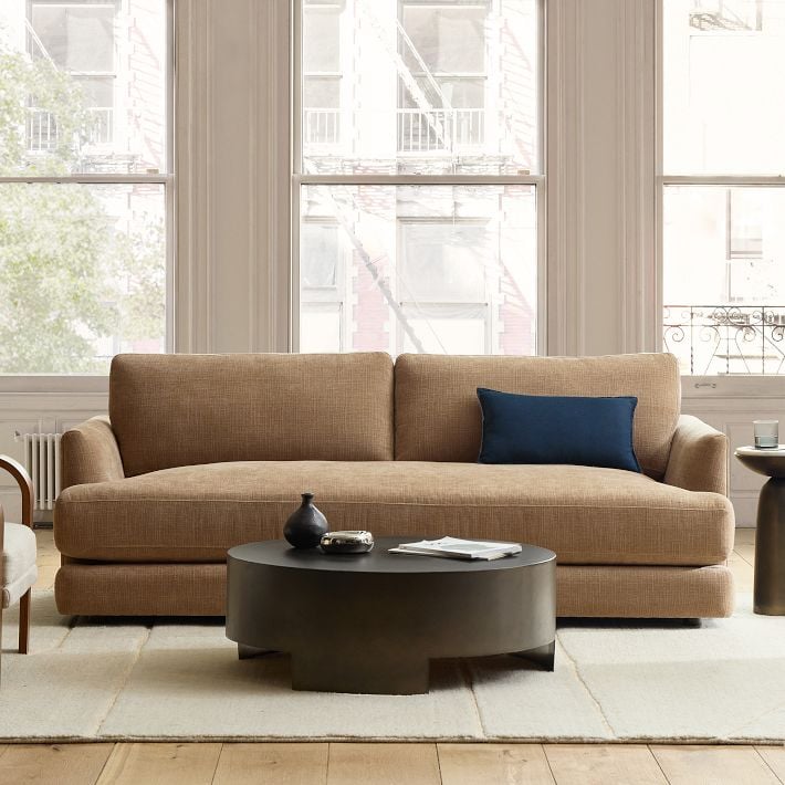 West Elm Haven Sofa ($1,359, originally $1,699)
This sofa is a West Elm furniture bestseller for a reason — it has a casual style that fits in anywhere, yet it still feels elevated enough to give your space that upgraded look. It's made with high-grade materials and hand-built wood frames, so you can trust it's going to last.