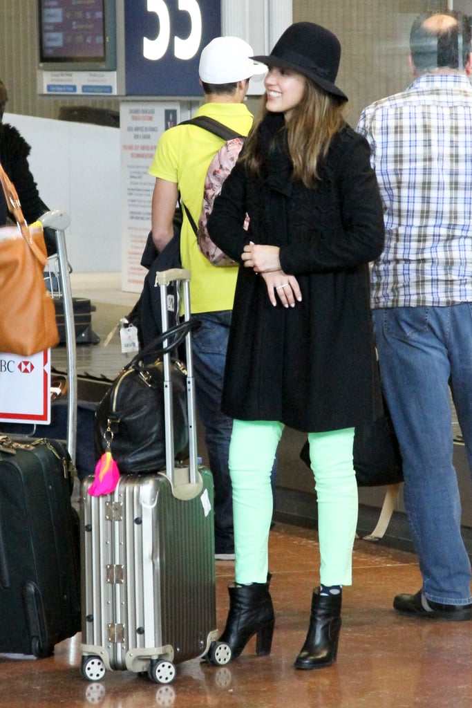 Jessica showcased her effortless take on neon, working a pair of vibrant green Current/Elliott ankle denim while arriving at LAX.