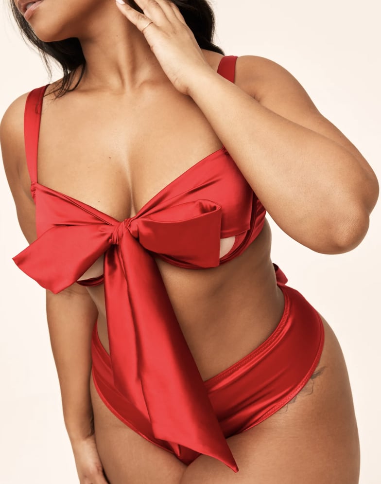 Adore Me Gynger Unlined Bra ($33, originally $55)
One thing to remember this Valentine's Day? You're the gift. And there's no better piece that exudes this than Adore Me's Gynger Bra. It not only comes in a gorgeous red, but features satin bow ties at the front and open cups — instantly making you feel special.