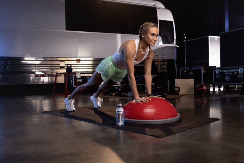 Carrie Underwood working out on tour courtesy of Bodyarmor