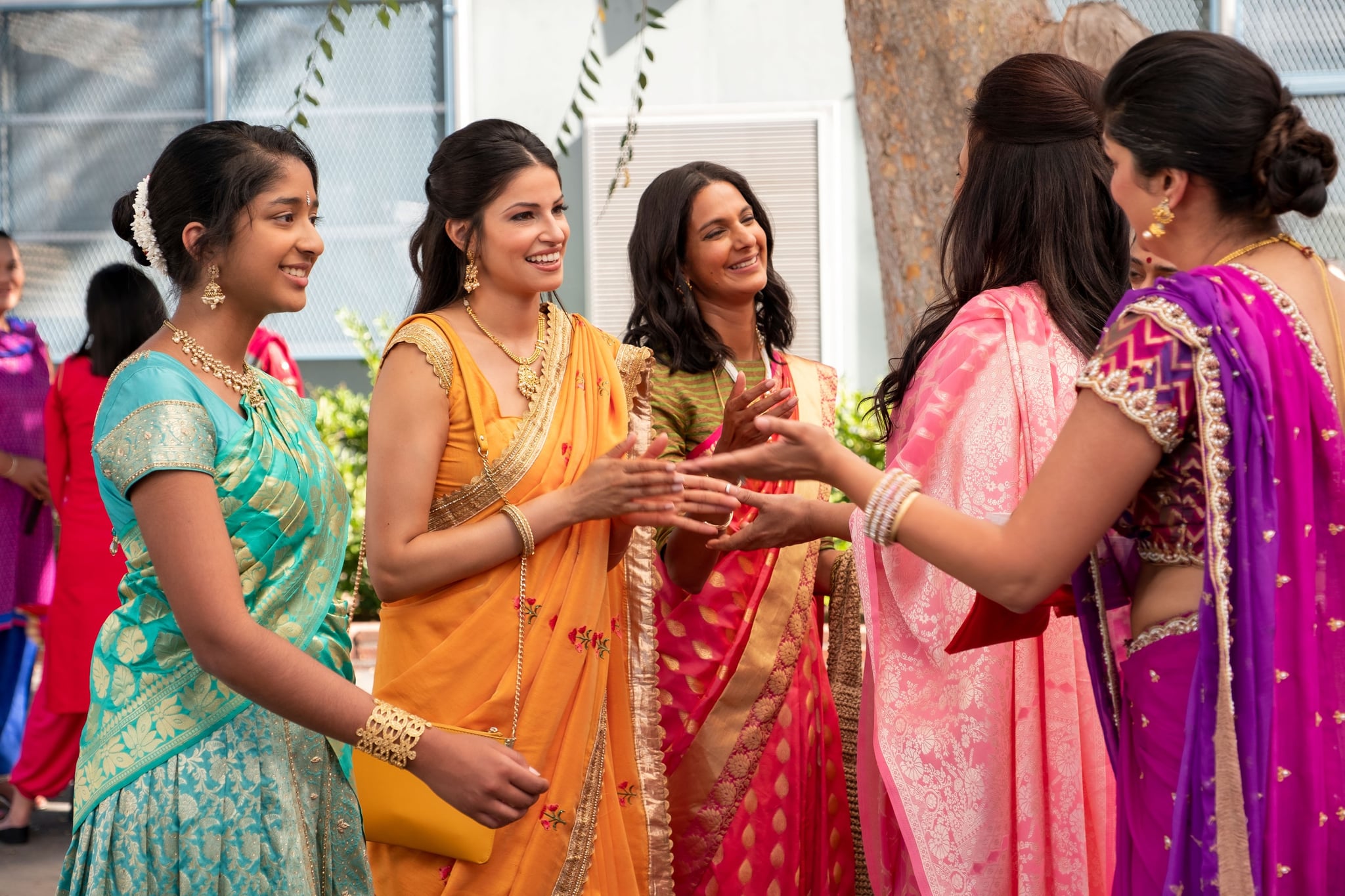 NEVER HAVE I EVER, from left: Maitreyi Ramakrishnan, Richa Sukla, Poorna Jagannathan, Alice Amter (back to camera), Sohm Kapila (back to camera), '...gotten drunk with the popular kids', (Season 1, ep. 103, aired April 27, 2020). photo: Lara Solanki /  Netflix / Courtesy Everett Collection