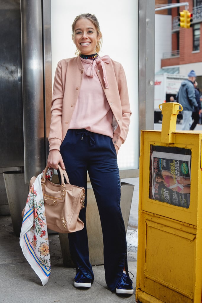 On Editor Sarah Wasilak: Aritzia top, jacket, and scarf; H&M pants; Balenciaga bag; Kenneth Cole sneakers; and Roxanne Assoulin chokers