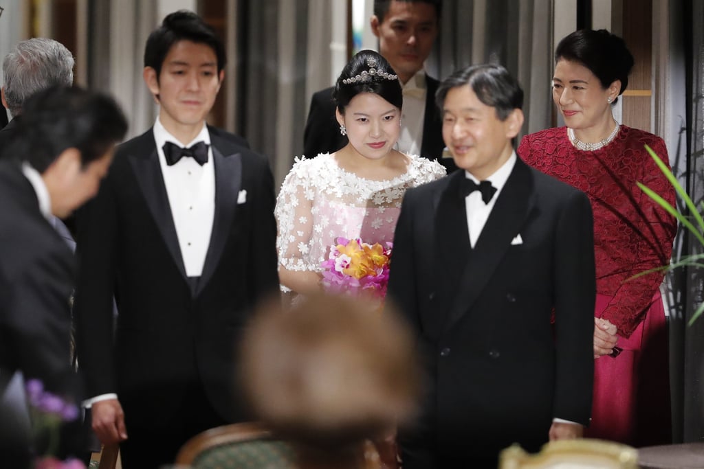 The Couple Celebrated at a Reception in Tokyo, Princess Ayako in a Crown and Floral Appliquéd Dress