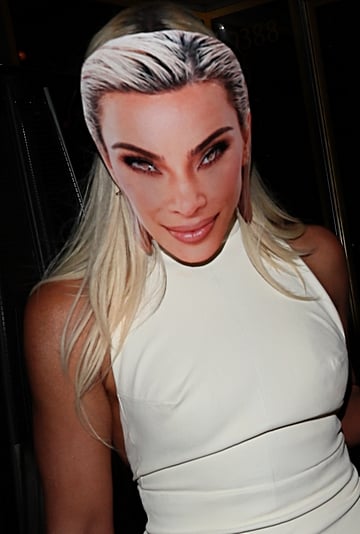 Khloé Kardashian Wears Kim Mask at Sister's 43rd Birthday