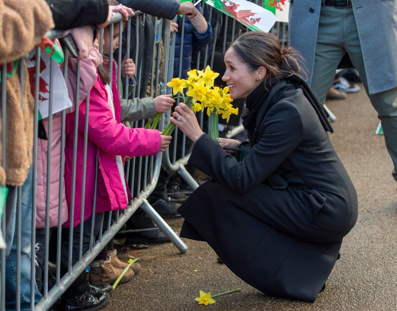 When She Graciously Accepted a Bouquet of Flowers