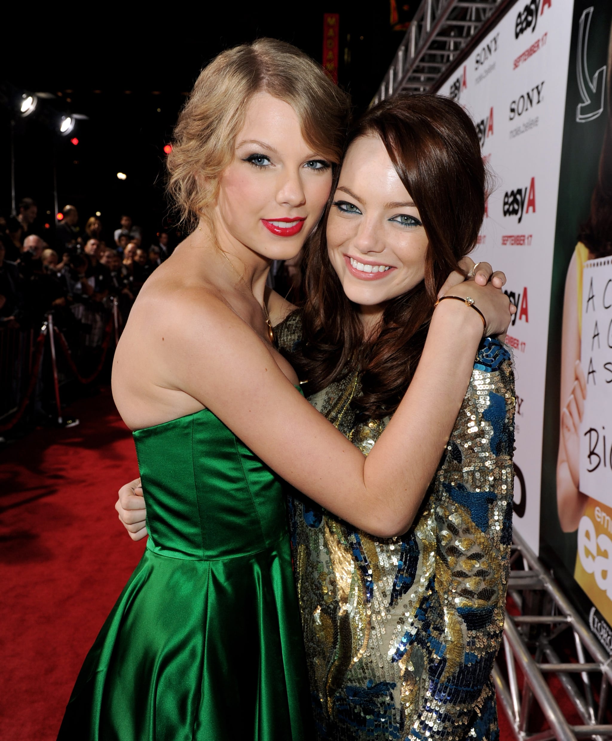 LOS ANGELES, CA - SEPTEMBER 13:  Singer/songwriter Taylor Swift (L) and actress Emma Stone arrive at the premiere of Screen Gems' 