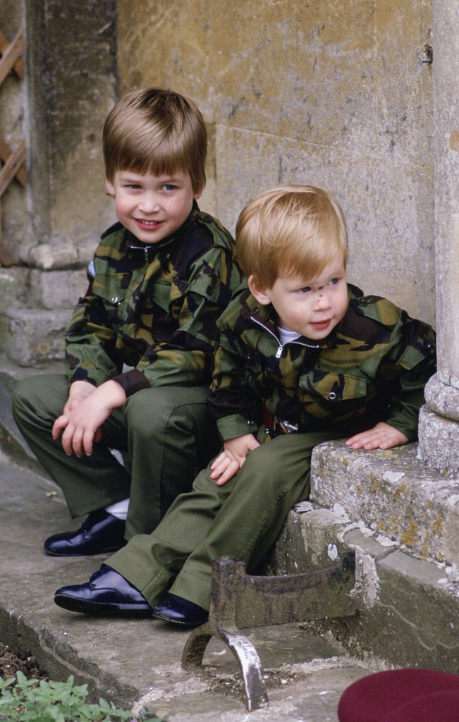 The boys wore matching army uniforms on the steps of Highgrove House in July 1986.