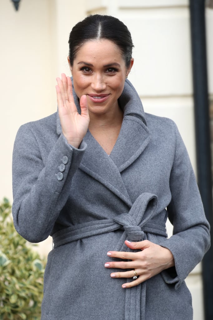 Meghan Markle Touching Baby Bump Pictures