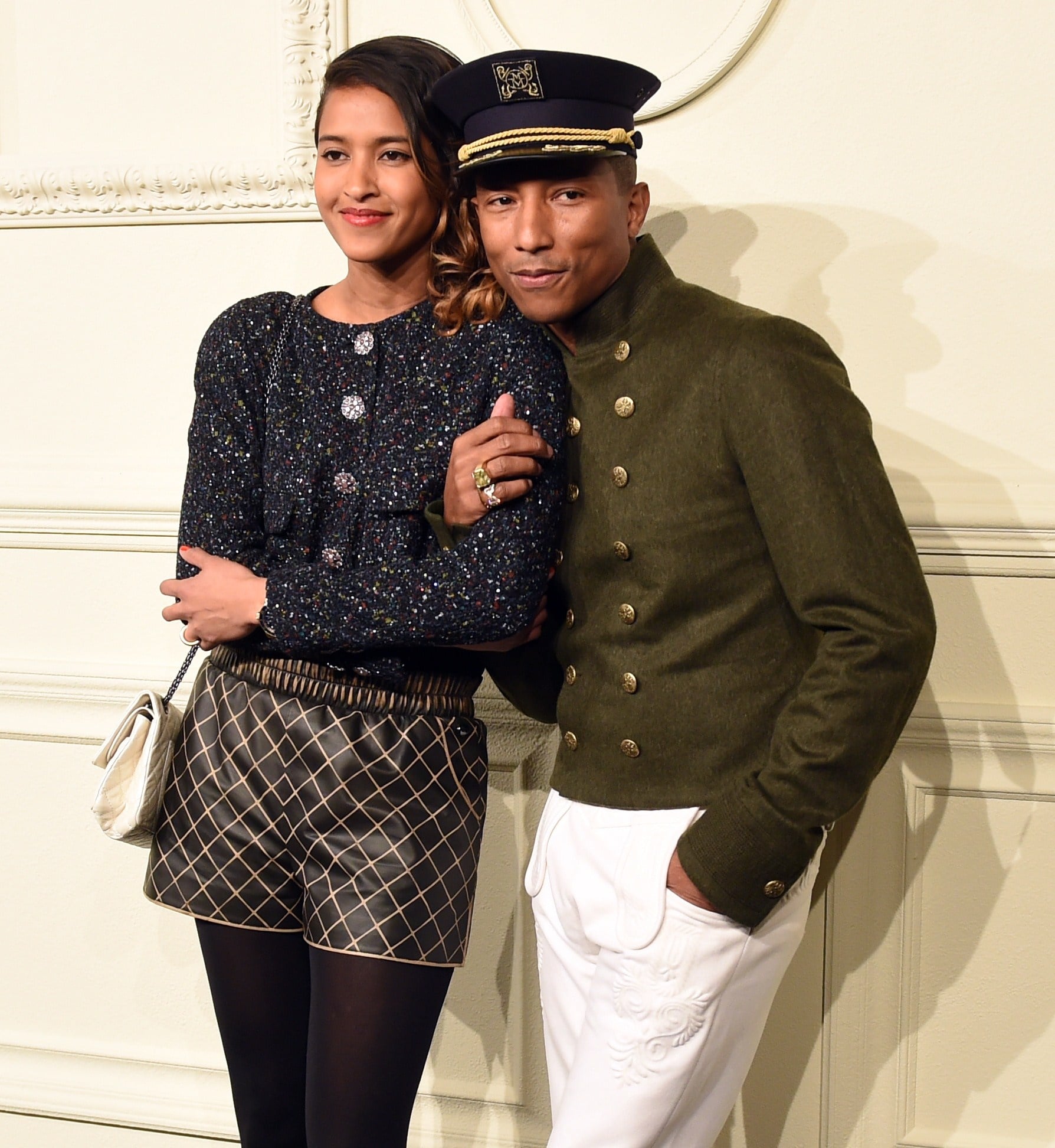 Pharrell Williams, right, and wife Helen Williams attend the