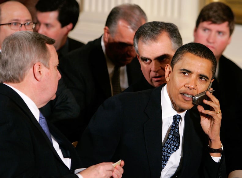 Chatting on his flip phone at the White Sox championship victory visit to the White House in 2006