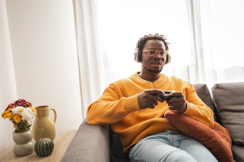 Man on Couch Playing Video Games