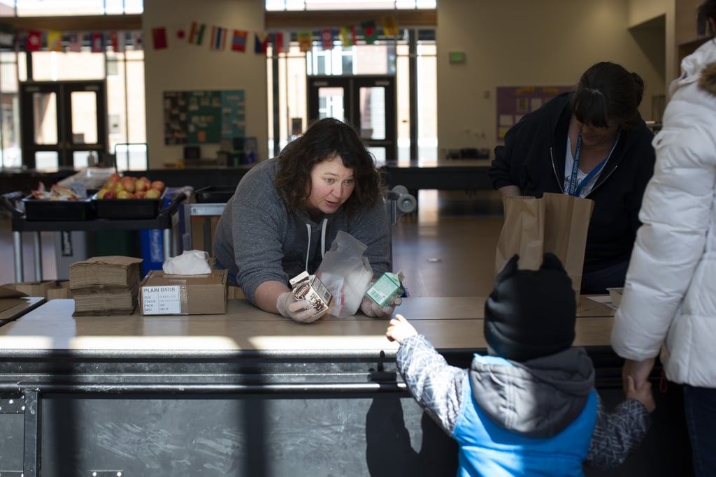 In March, a woman named Christy Cusick handed out free school lunches to families at Olympic Hills Elementary School in Seattle, WA.