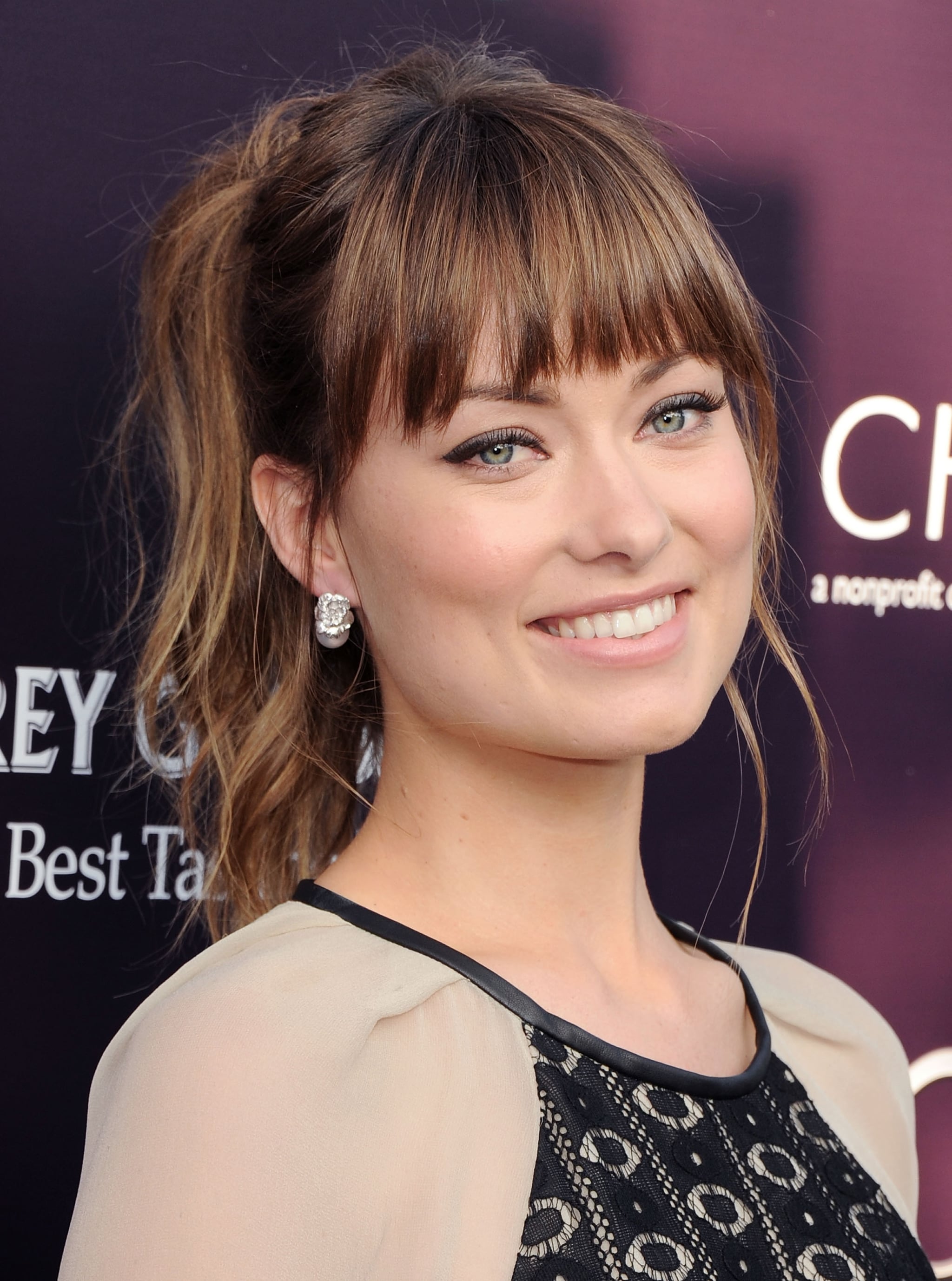 It Was A Flirty Textured Ponytail With Bangs For Olivia At The 2011 See Mom To Be Olivia Wilde S Beauty Evolution Popsugar Beauty Uk Photo 5