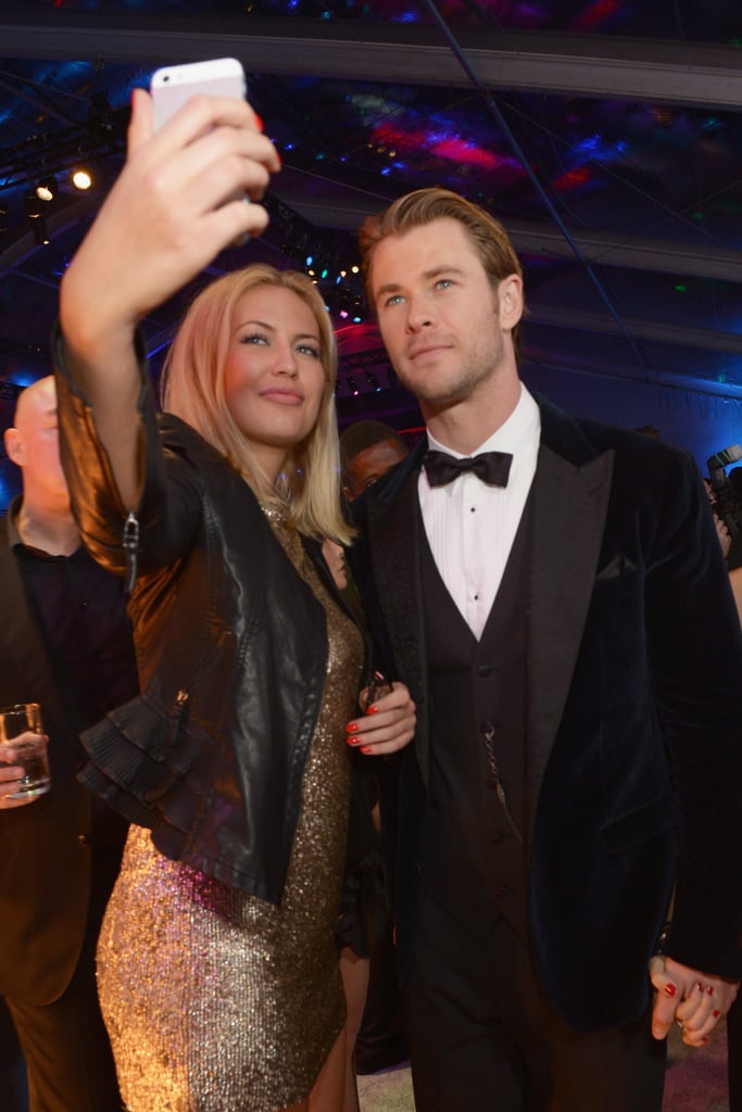 Chris Hemsworth was game for a fan selfie at the NBC afterparty.