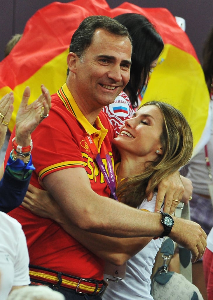 Letizia and Felipe shared a big embrace while watching Spain beat Russia during during the Olympic basketball semifinals in August 2012.