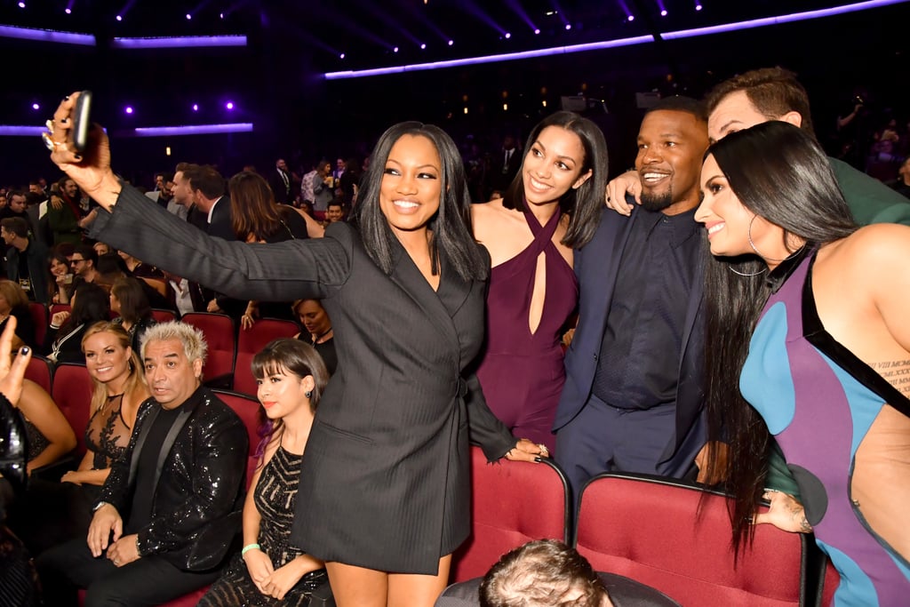 Pictured: Garcelle Beauvais, Corinne Foxx, Jamie Foxx, and Demi Lovato