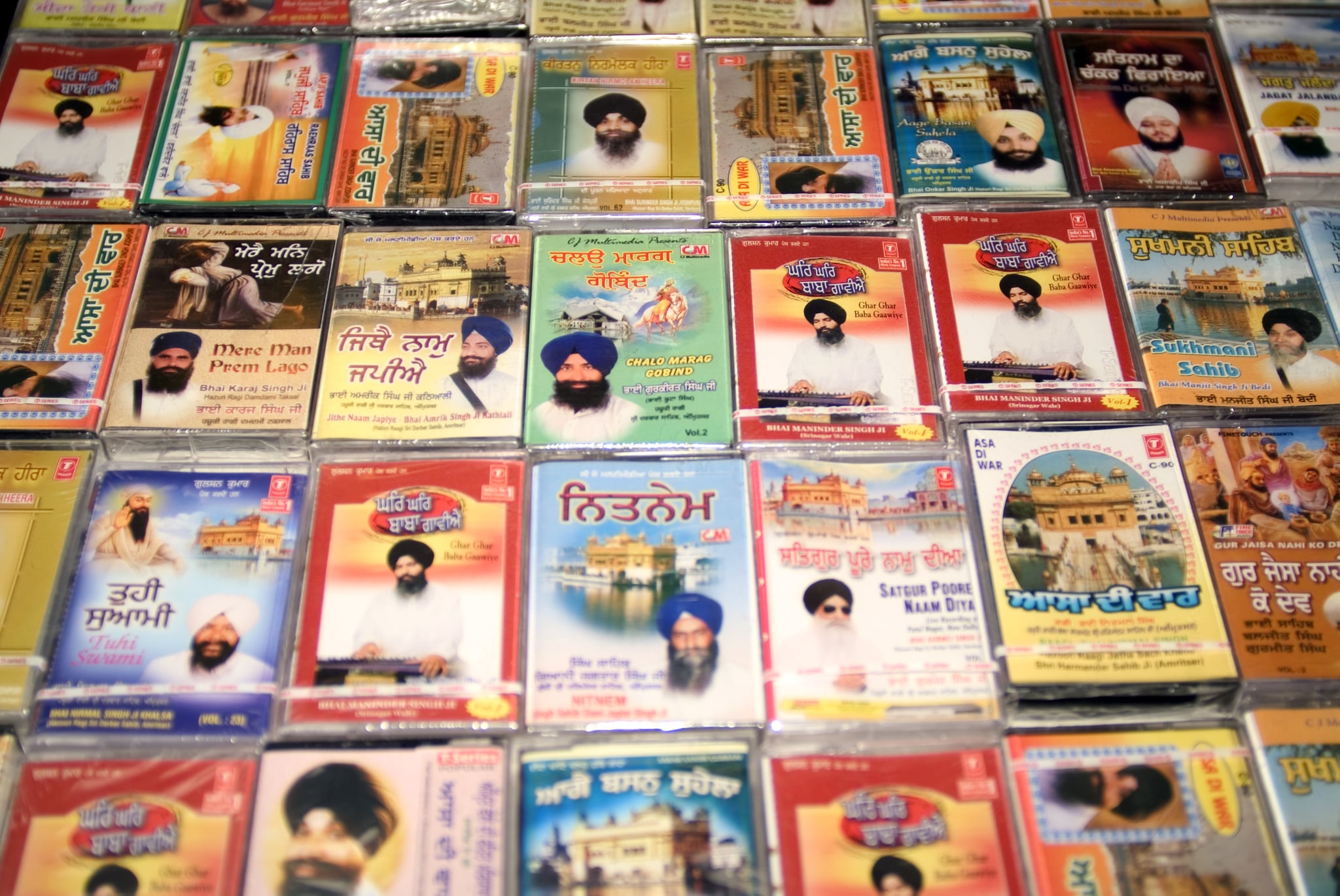 Punjabi music cassette tapes on sale in Sikh temple or Gurdwara Sri Guru Singh Sabha Hounslow UK. (Photo by: Photofusion/Universal Images Group via Getty Images)