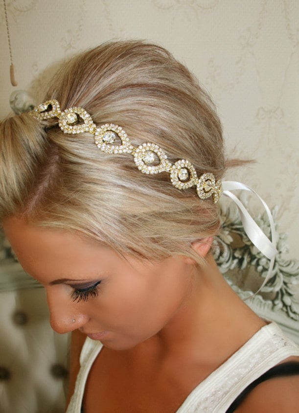 Rhinestones in the shape of teardrops give this gold hair piece ($48) its unique look. The ribbon also comes in customizable colors.