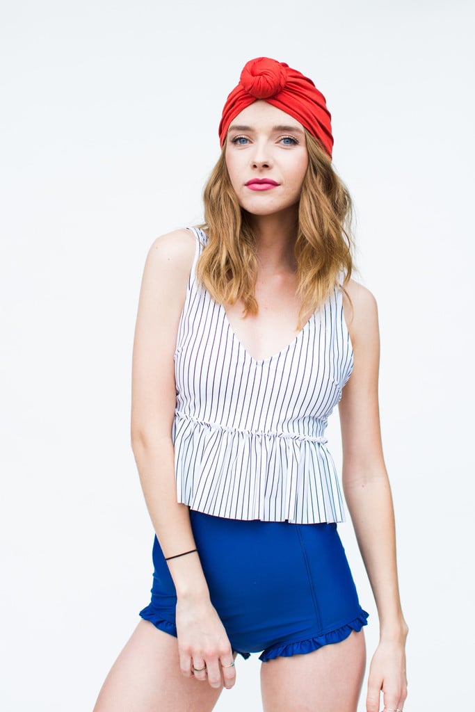 The Suit: Kortni Jeane Sweetheart Peplum Top ($68) and All Ruffled Up Bottoms ($36)
Why It Flatters: The high-waisted bottoms tuck in your tummy, and the peplum ruffle on the top hides love handles. Plus, the neckline offers a hint of cleavage at the same time.