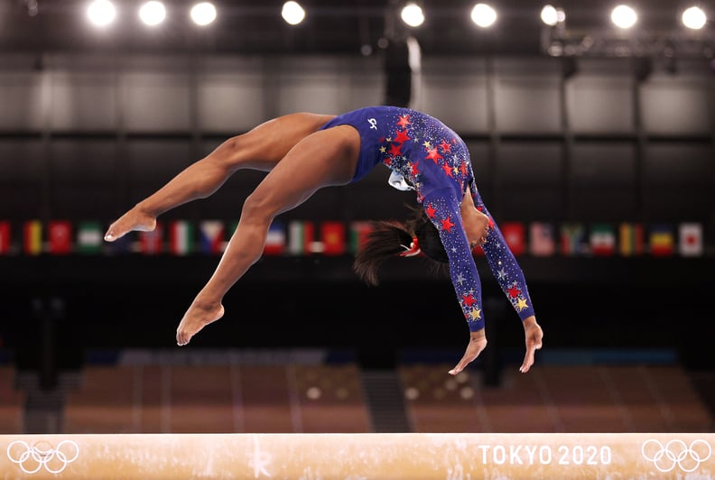TOKYO, JAPAN - JULY 25: Simone Biles of Team United States competes on balance beam during Women's Qualification on day two of the Tokyo 2020 Olympic Games at Ariake Gymnastics Centre on July 25, 2021 in Tokyo, Japan. (Photo by Ezra Shaw/Getty Images)