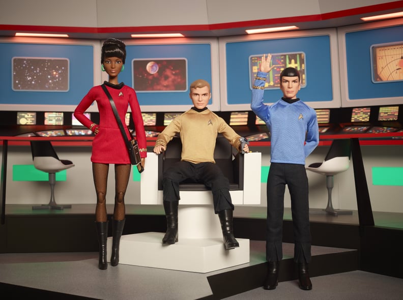 A complete look at the Uhura, Captain Kirk, and Spock Barbie dolls.