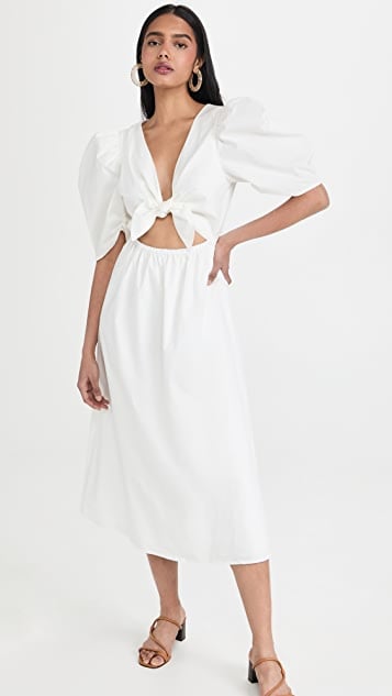 A Puff Sleeve Dress: Wayf Peggy Twist 