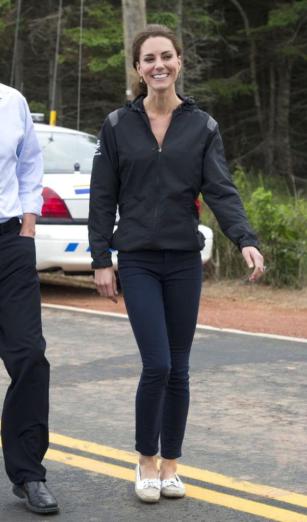 Kate made use of her J. Brand jeans and Sebago boat shoes twice on the trip. Here, she wore a sporty Nike windbreaker to tour Dalvay Lake. 
