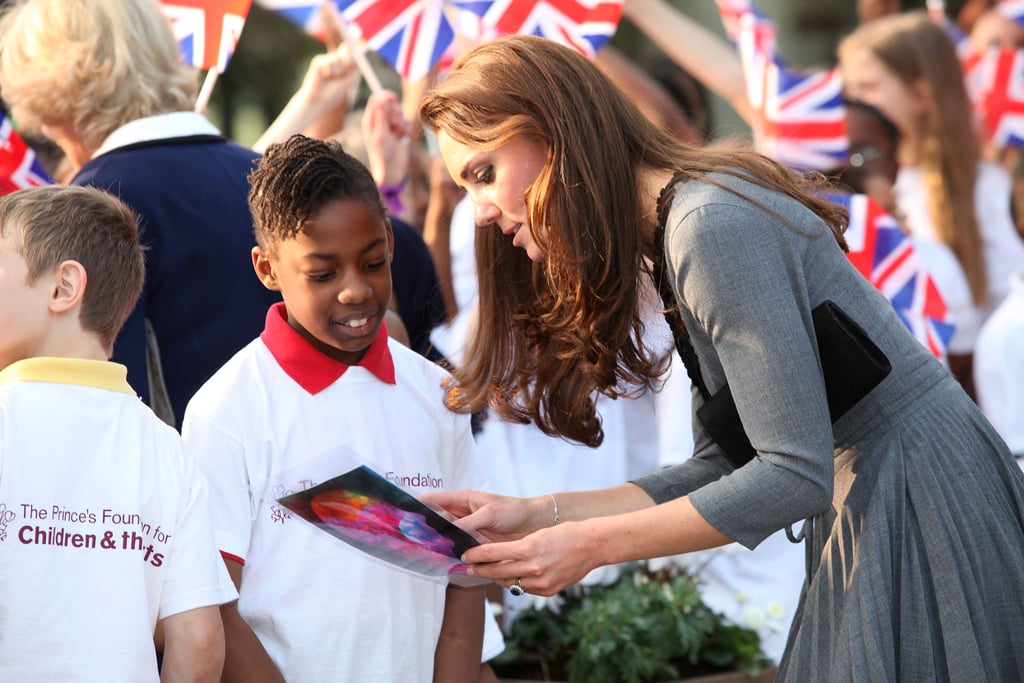 Kate talked with a little boy before leaving London's Dulwich Picture Gallery in March 2012.