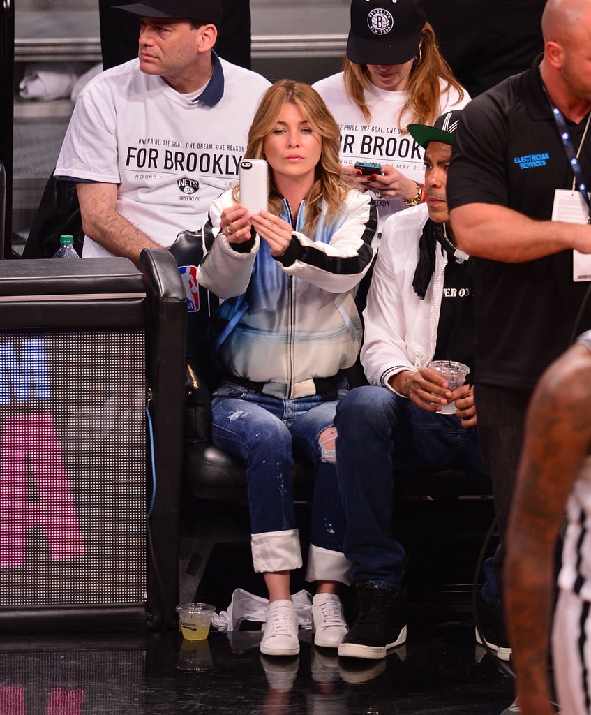 Drake and Ellen Pompeo at a Brooklyn Nets Game