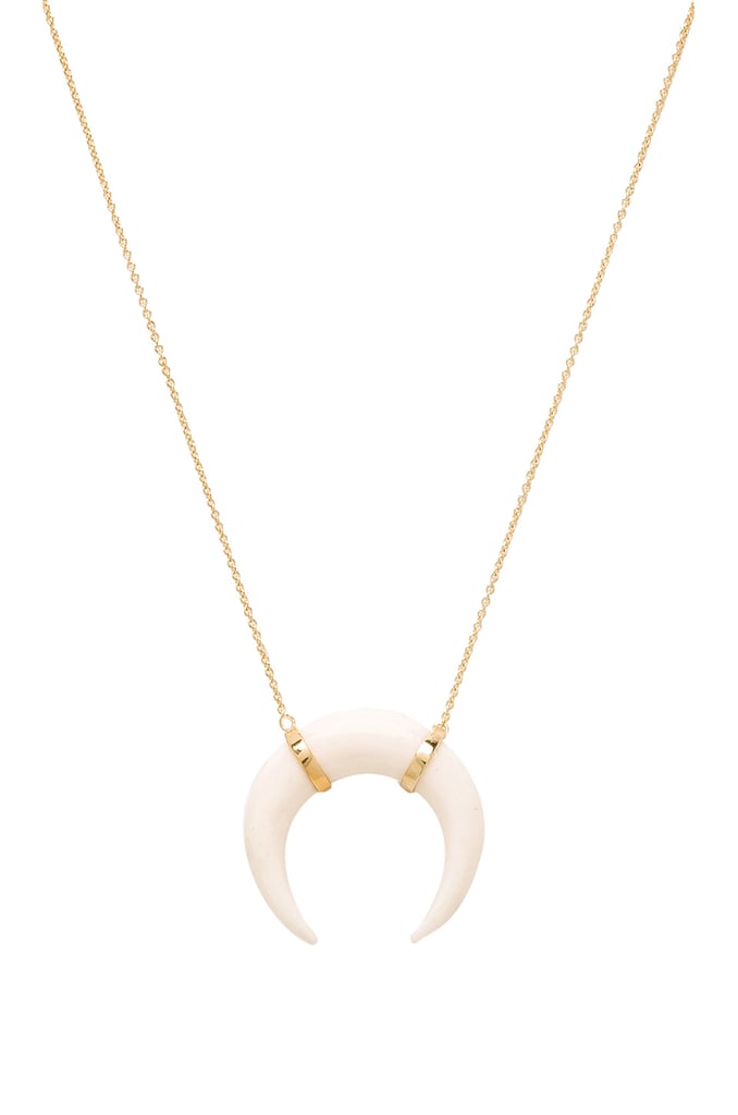 "Jacquie Aiche makes so many wonderful pieces, but this one completes any outfit, no matter where you are going." 
Jacquie Aiche Bone Pendant Crescent Necklace ($220)