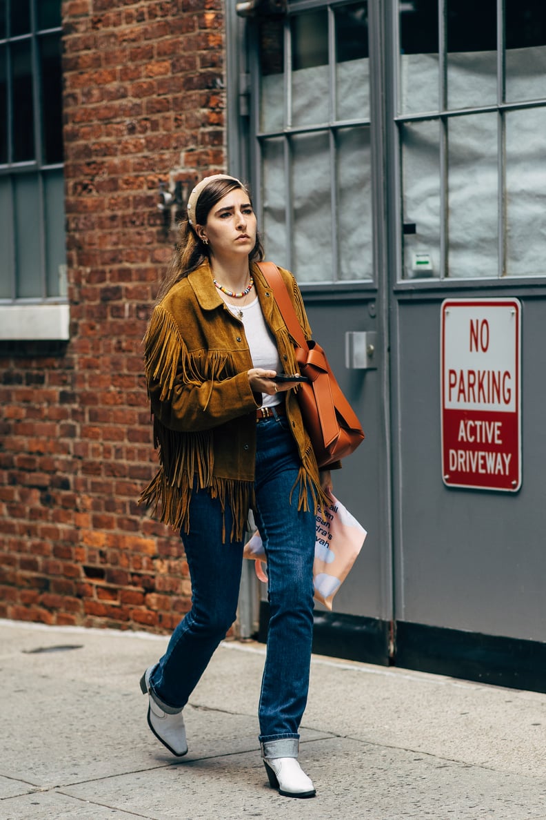 Fringe Jacket Outfit Idea: Jeans + Western Boots + Headband