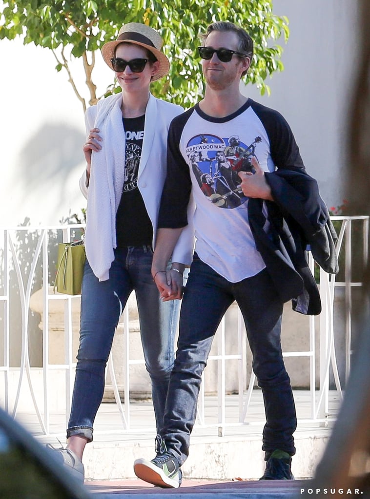 Anne Hathaway and Adam Shulman held hands while walking through Miami on Sunday.