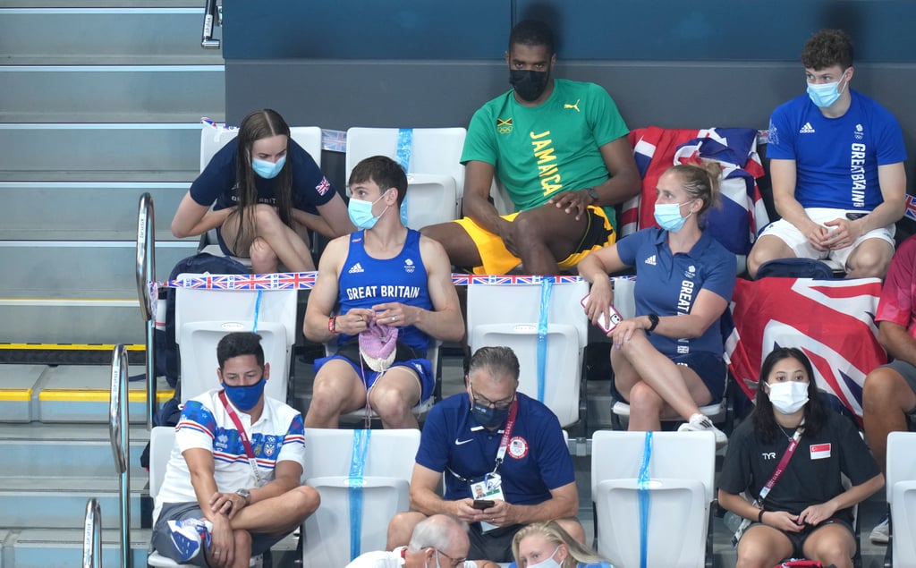 Tom Daley Seen Knitting in Stands at Tokyo Olympics | Photos